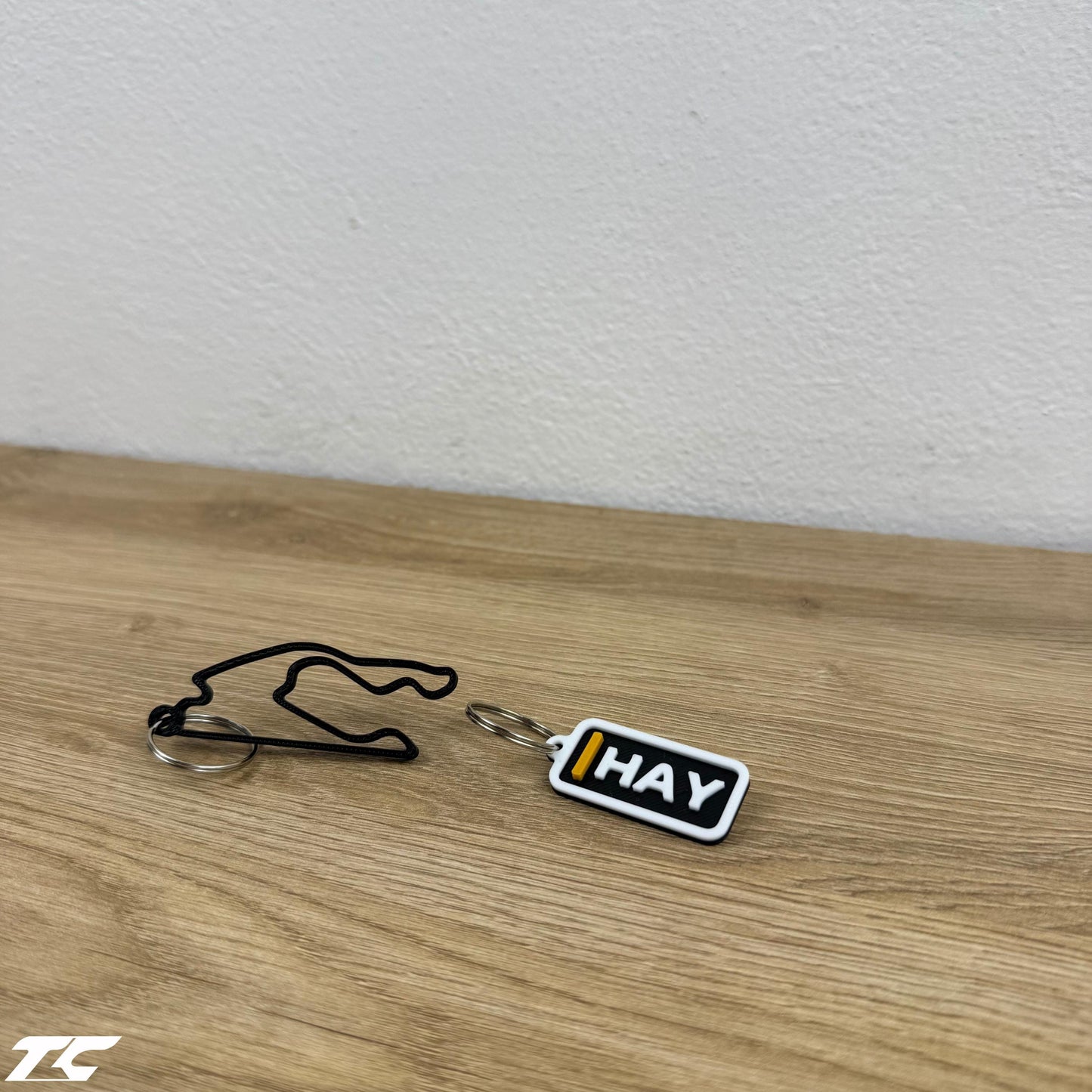 F1 The Movie Keychain Set – Driver Tag + Circuit Track | Sonny Hayes or Joshua Pearce