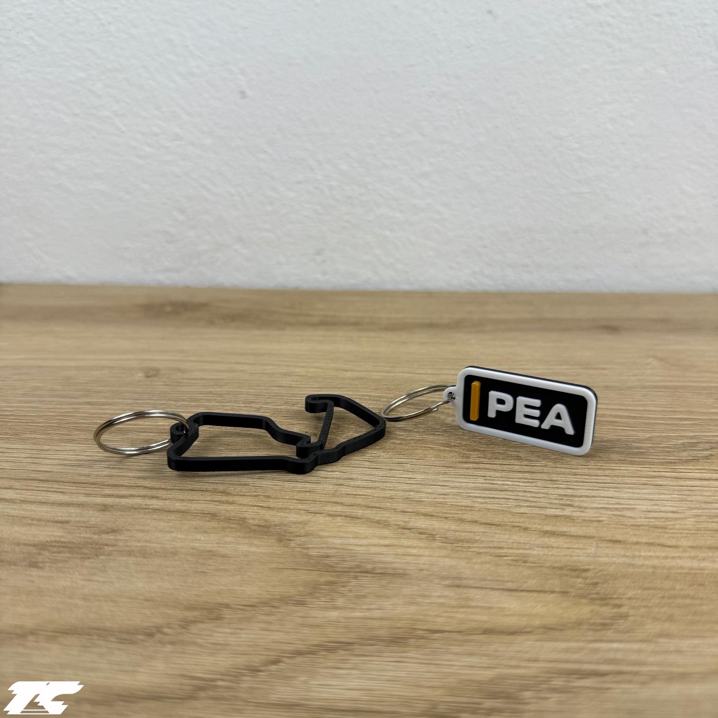 F1 The Movie Keychain Set – Driver Tag + Circuit Track | Sonny Hayes or Joshua Pearce