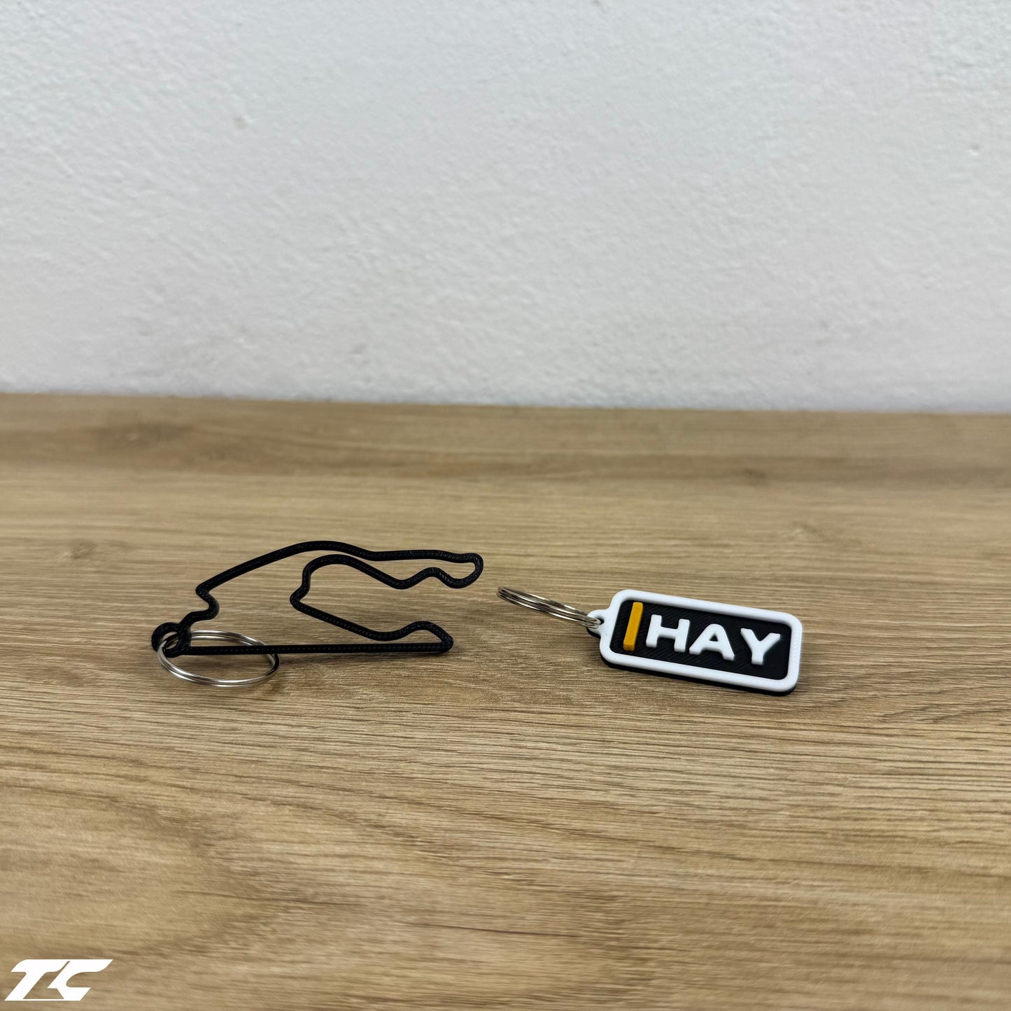 F1 The Movie Keychain Set – Driver Tag + Circuit Track | Sonny Hayes or Joshua Pearce