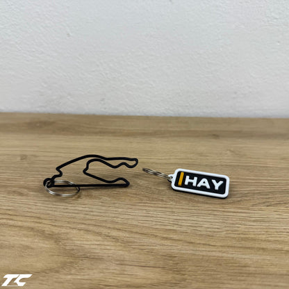 F1 The Movie Keychain Set – Driver Tag + Circuit Track | Sonny Hayes or Joshua Pearce