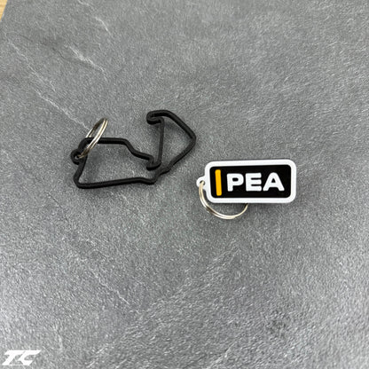 F1 The Movie Keychain Set – Driver Tag + Circuit Track | Sonny Hayes or Joshua Pearce
